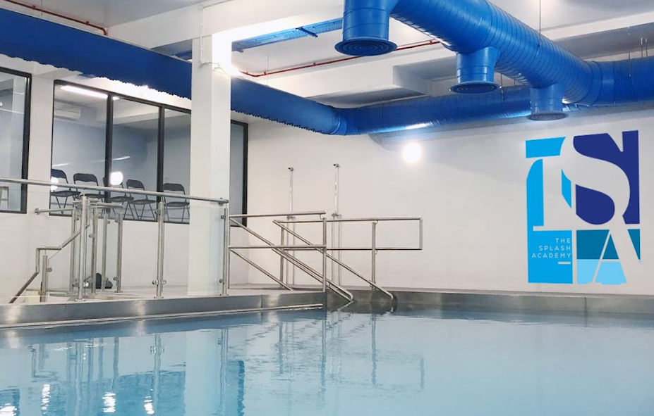 A photo of a modern swim school pool 
